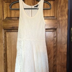 Knee length white lace dress